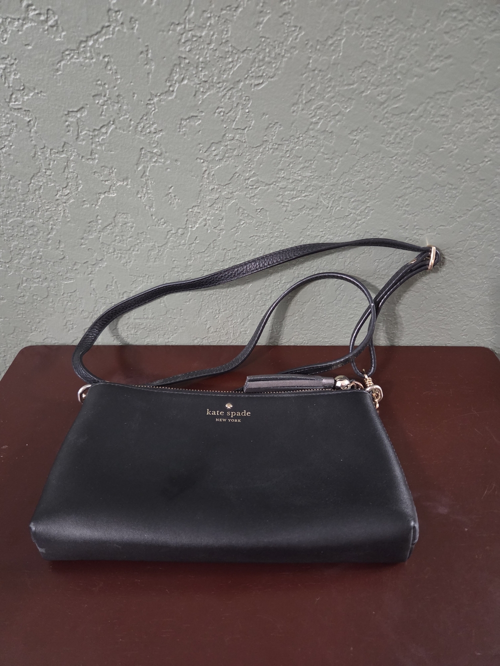 kate spade black leather crossbody with gold hardware